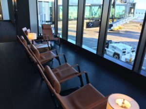 Lounge-style seating with spectacular views thanks to the floor-to-ceiling windows in the new Paine Field terminal