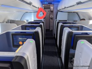 Flyer beware: There's a camera in the cabin so the crew an still have direct line of sight (safety requirement) given the monuments and such.