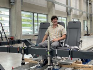 Of course I climbed up on the test rig to give it a try. Fortunately the team at Recaro declined to simulate a crash while I was on board.