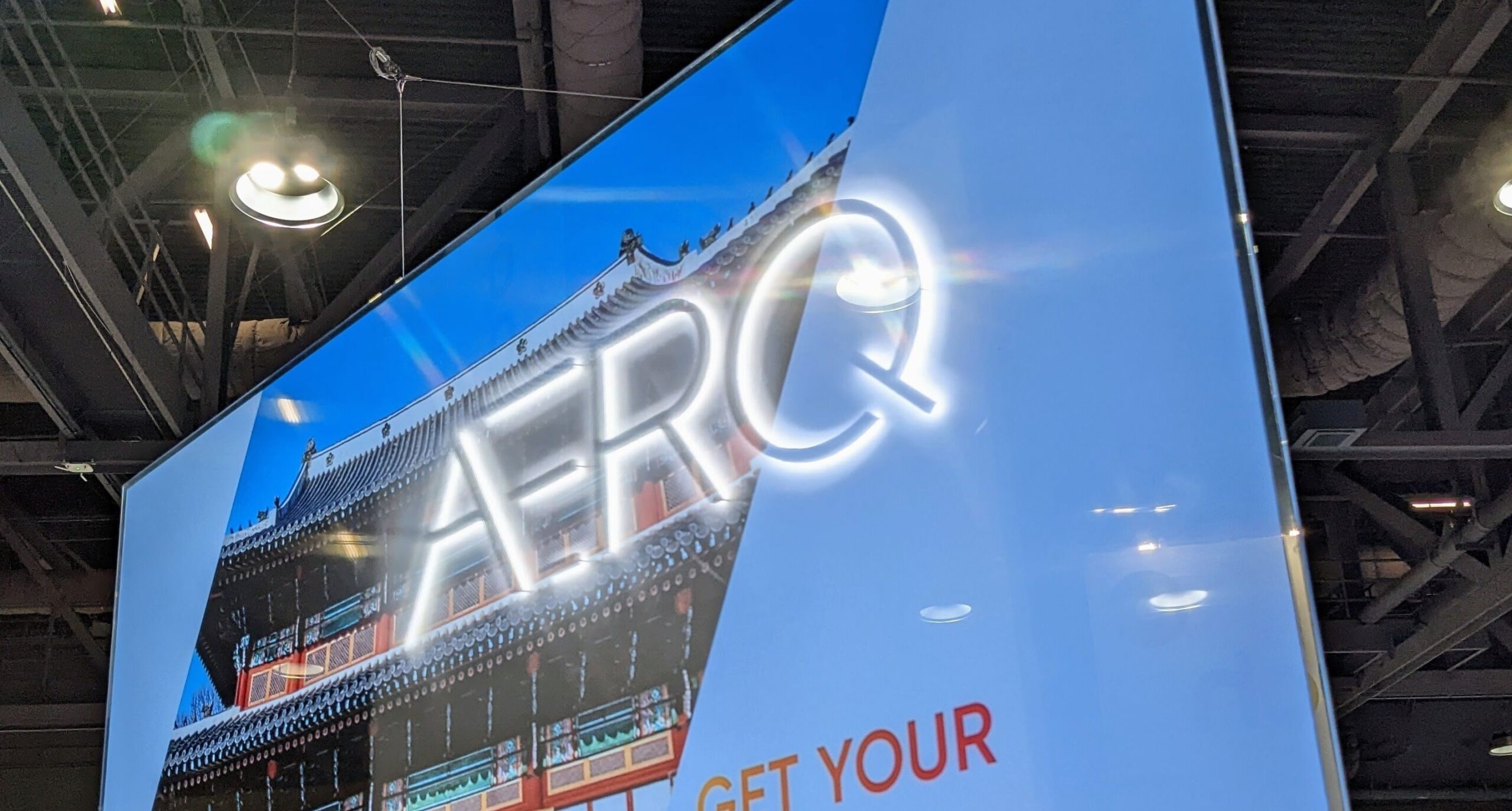 aerq-transparent-screen-aviation-use Transparent television showing content on the screen while the real world behind it remains visible.