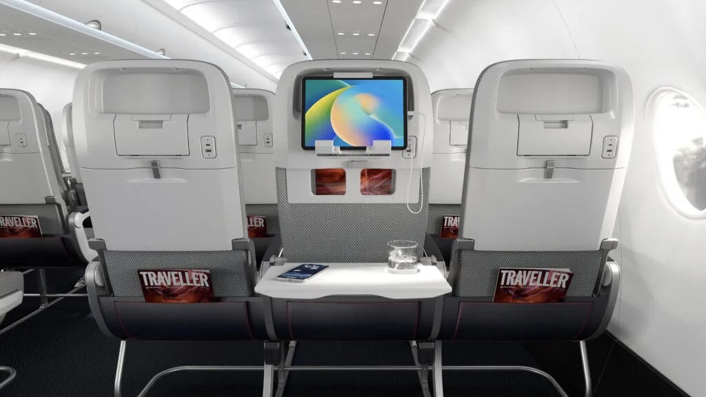 Showing off a tablet holder option for IFE, as well as a convenient in-seat USB power option, on the new Helix economy class seat (image via Collins Aerospace)