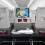 Showing off a tablet holder option for IFE, as well as a convenient in-seat USB power option, on the new Helix economy class seat (image via Collins Aerospace)