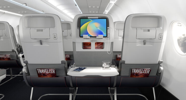Showing off a tablet holder option for IFE, as well as a convenient in-seat USB power option, on the new Helix economy class seat (image via Collins Aerospace)