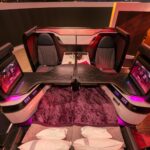 Demo model of the Qsuite Next Gen four seat, with the screens folded out of the way