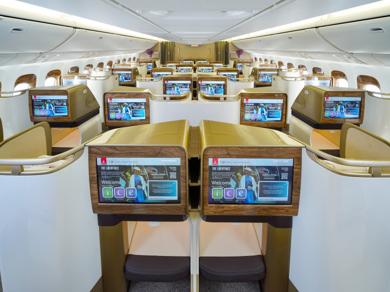 Large IFE screens in Emirates' new business class cabin on the 777 fleet (image via Emirates)