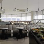 The new self-serve buffet area, and plenty of seating, at British AIrways' Seattle lounge (image via British Airways)