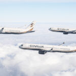 A rendering of the Starlux fleet in flight