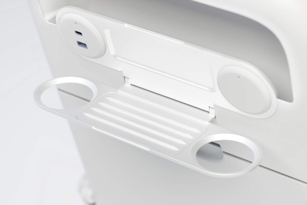 The Expliseat device holder is modular, including options for a cup holder and power ports