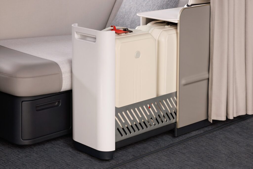 The double bag stowage at ground level is a nifty trick of suite layout (image via Air France)