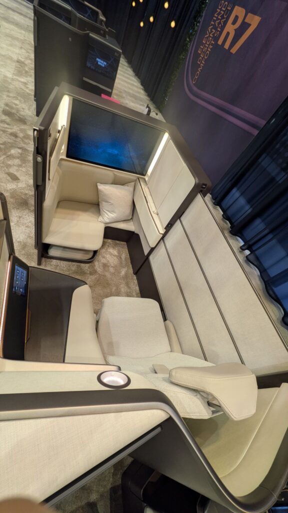A massive IFE screen, and more visual space, on the R7 front row option from Recaro
