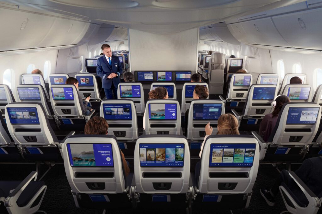 The economy class cabin features large screens, among other bits (Image via United)