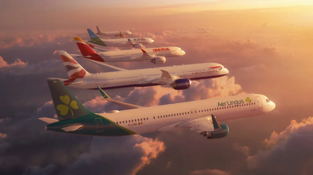five planes rendered next to each other in flight at sunset