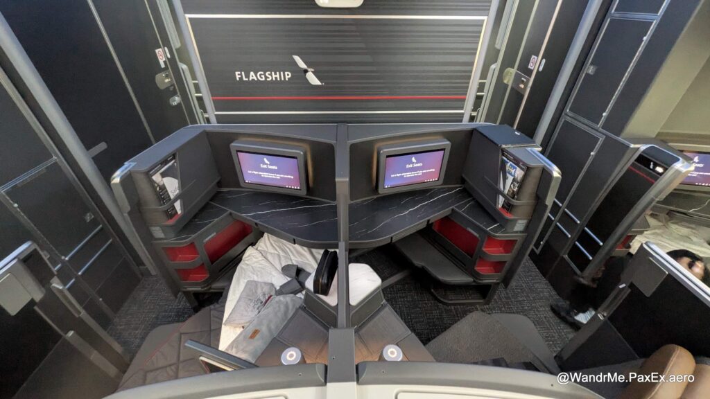 Flagship Business Preferred includes extra stowage space in the seat, visible with the red trim