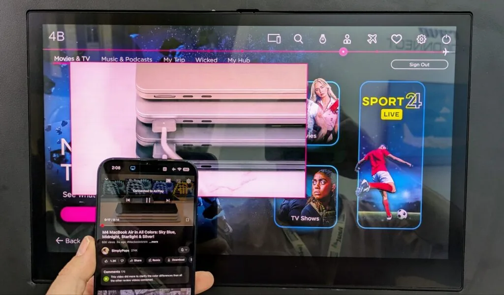 An iPhone being used to control the content on a Safran RAVE IFE screen