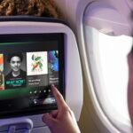 IFE screen showing Spotify content