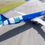 Blue JetBlue A321 with teal and white 
