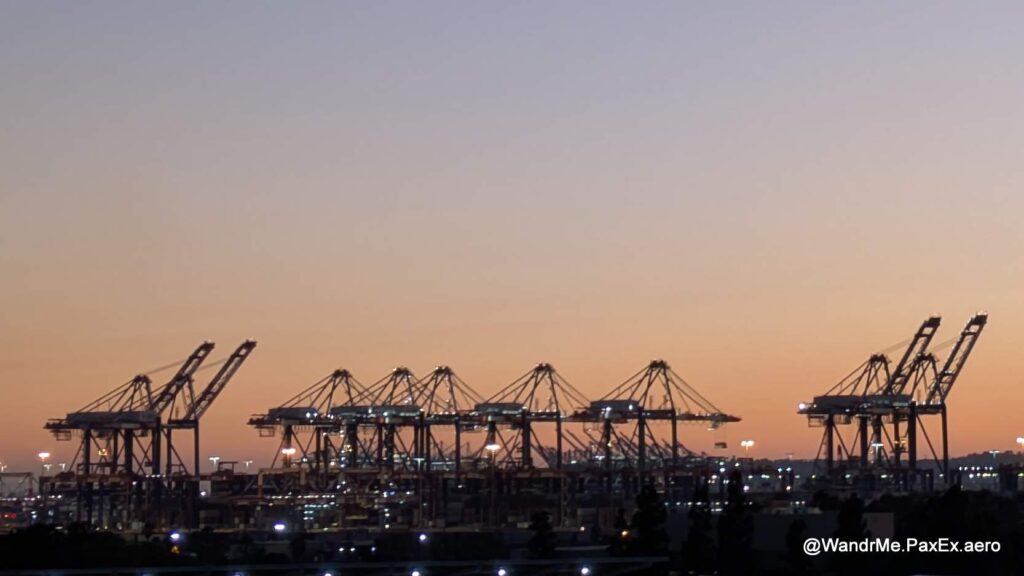 Cargo cranes at sunset over the Long Beach port