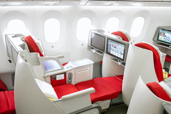 2-2 business class seats in an airplane cabin