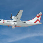 White ATR 42 with the JSX X on the tail and fuselage