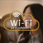 WiFi logo in front of a blurred woman's face