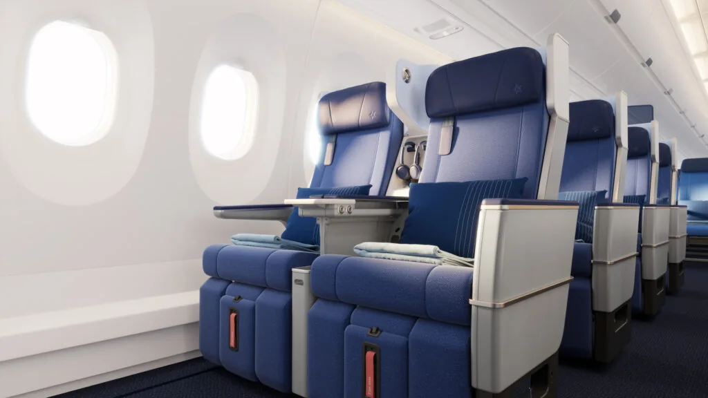 A typical premium economy layout brings more space and a smidgen of privacy to the mid-priced cabin