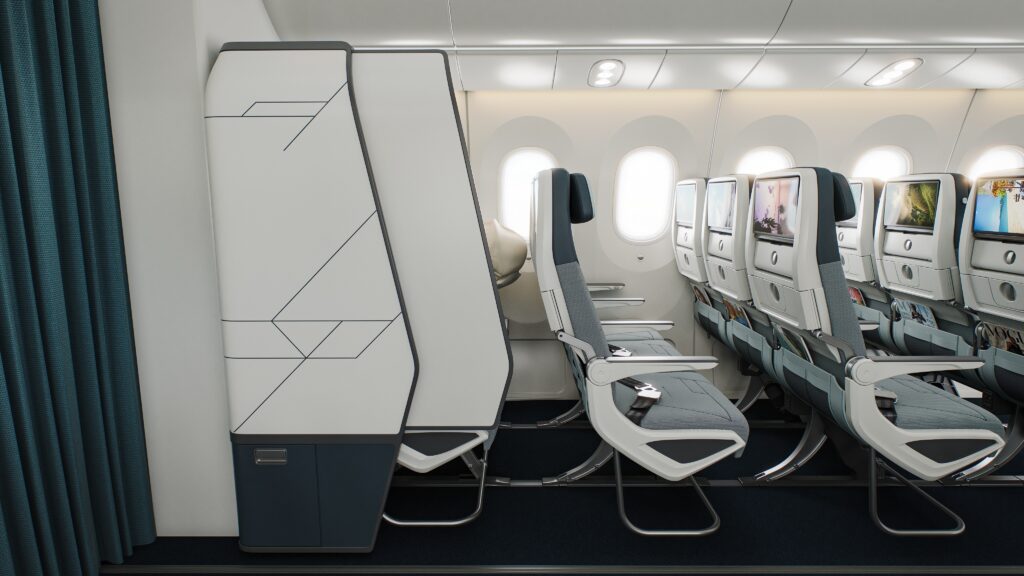 Last row in economy class on a plane, featuring Collins' SkyNook concept, including a privacy door.