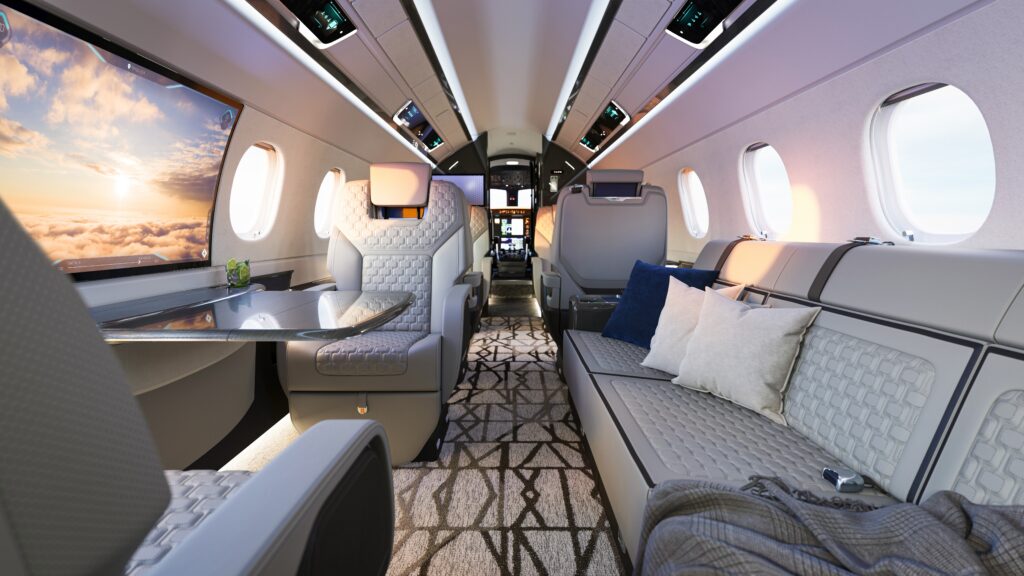 Interior of Embraer's Praetor 600E, including a giant curved screen built in to the fuselage and showing the outside view via cameras.