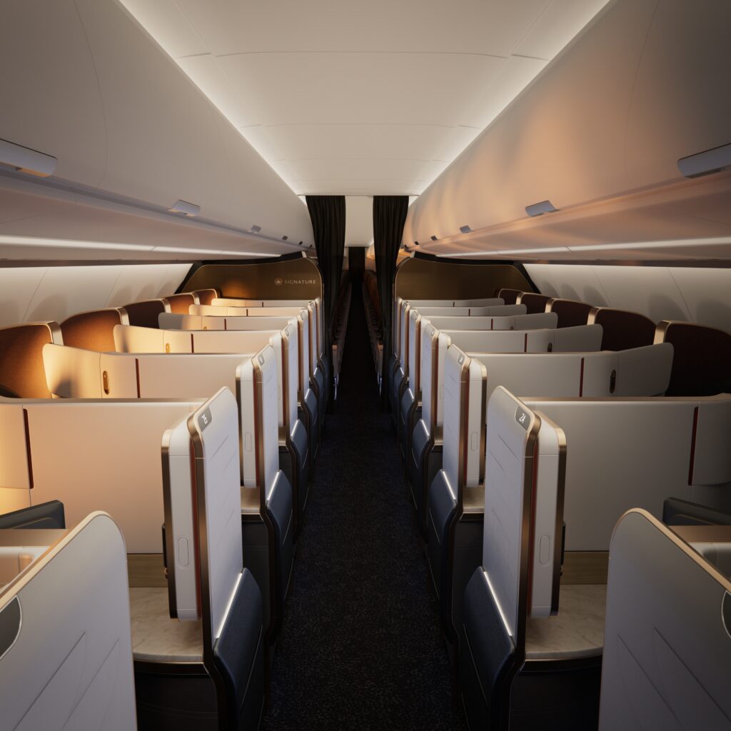 Looking down the aisle from the front galley with seven rows of business class seats in a 1-1 layout