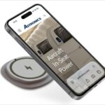 mobile phone hovering over the new Astronics emPower Qi2 wireless charging interface.