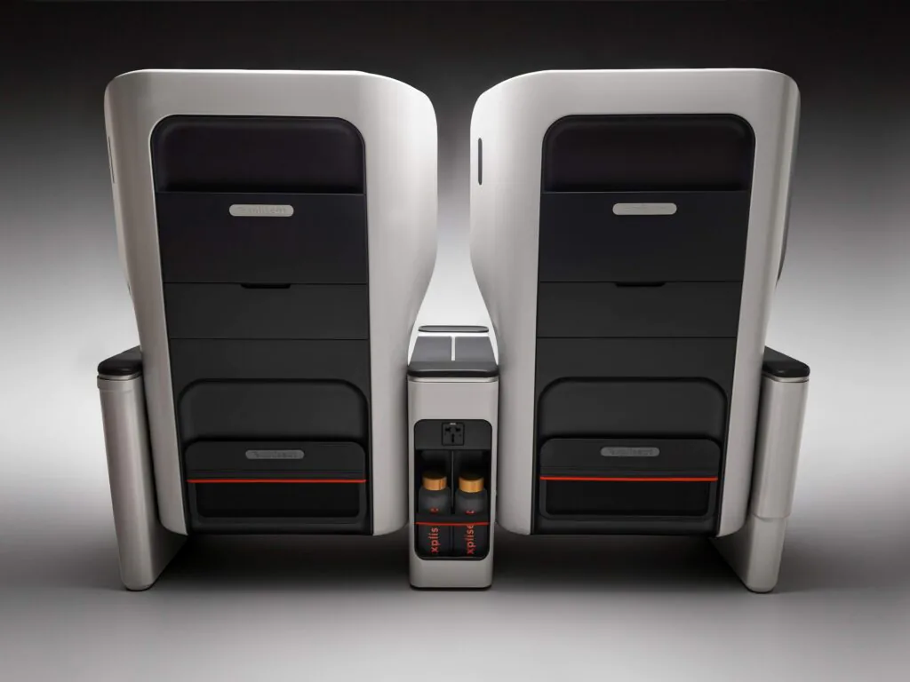 back of a pair of Expliseat TiSeat S premium seats for a regional jet, with ample stowage