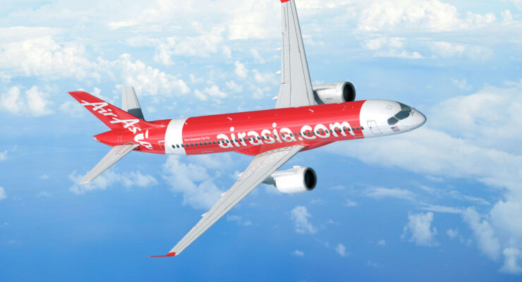 rendering of the A220 in AirAsia's red livery, flying in blue skies with a few clouds