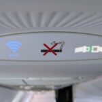 Airplane PSU display with wifi, seatbelt, and no smoking indicators