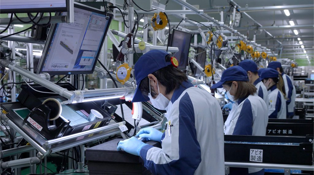 Employees at Panasonic Avionics factory work on assembly of the Astrova monitors that are key to the company's IFE future (image via PAC)
